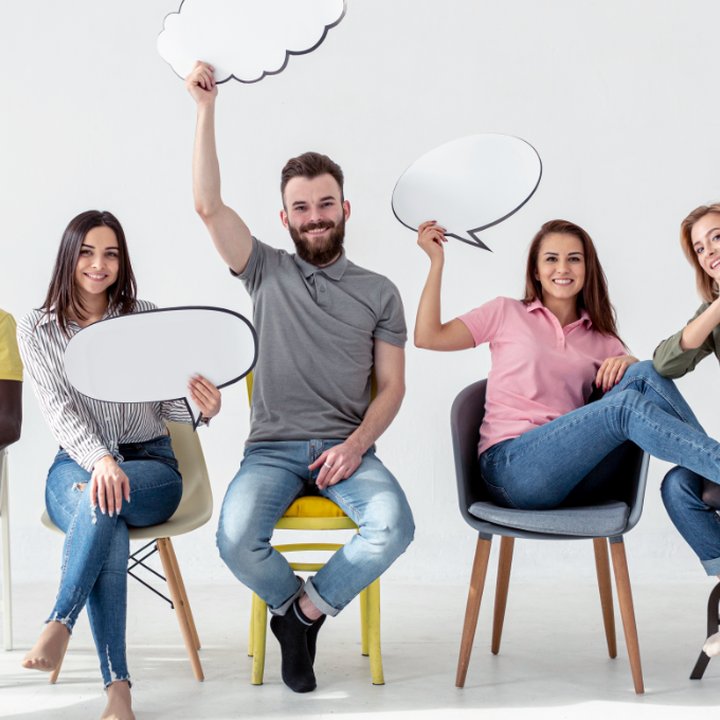 Group of young people sitting with idea bubbles in their hands. Langly logo in the corner.
