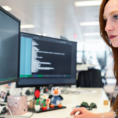 a girl in front of the computer